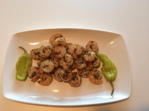 1/2 lb shrimp 1tsp parsley 1tsp rosemary 1tbsp pepercinni juice 1tbsp melted butter 1tbsp olive oil paprika to taste (I use about 1tsp) salt and pepper to taste (I use ground pepper and coarse sea salt) Preheat oven to 400 deg.  Mix all ingredients together in a bowl with peeled and deveined shrimp.  Let shrimp and marinade set at room temperature for about 15 minutes.   I line a baking pan with parchment paper and roast shrimp for 8-10 minutes or until the shrimp are pink. 