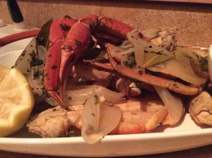 2 lbs crab legs 1 tbsp parsley 2 1/2 bay leaves 1 1/2 oz Old Bay 1/2 lemon's juice 1 onion 2 c chicken broth salt water In a large pot (I used a 16qrt pot), add chicken broth; fill the rest of the pot a little over half full with water.  Add parsley, bay leaves, 1 1/2 oz Old Bay, 1/2 lemon's juice, generous amount of salt, and one onion cut into large pieces to water and chicken broth.  Bring to a boil.  I let the water boil for about 5 minutes to add flavor to the water. Add crab legs and let cook (in boiling water) for about 8-10 minutes.  Remove from water and serve immediately.
