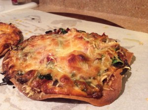 My Favorite, Roasted Mushrooms, Spinach and Meat Pizza: Pizza Toppings: 1 Large Tortilla 1/4 c mushrooms 1 Slice of Prosciutto 1 Slice of ham 2 Slices of Bacon 1/3 c provolone 1/3 c mozzarella 1/3 c parmesan  *spinach-enough to coat the pizza (8-10pcs) olive oil, salt and pepper, parsley, and rosemary for sautéing mushrooms Sauce: 1 tbsp olive oil 1 tsp rosemary 1 tsp parsley salt and pepper to taste Heat large tortilla on 375 for 5-7 minutes. Sautéing Mushrooms:  In a small sauté pan, coat bottom with olive oil, add mushrooms and seasonings and cook on medium/medium high until mushrooms are tender (about 6 minutes). Sauce: Mix olive oil, rosemary, parsley, salt and pepper with whisk. Coat toasted tortilla with sauce.  When adding the toppings to the pizza, there is no correct way to do it.  I always add the meat last and top with parmesan so that it all browns.   Bake Pizza on 375 for 10-18 minutes.  I know, that is a huge variance with cooking time, but I like my pizzas super crispy, so I opt to cook them a little longer.  