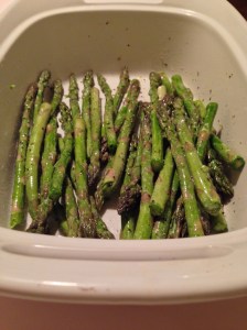 Asparagus: 1 bundle baby asparagus 1 tbsp olive oil 2 tbsp butter 1 tbsp minced garlic salt and pepper Preheat oven to 375 degrees. In a nonstick baking dish, add the asparagus, olive oil, minced garlic, and generous amount of salt and pepper.  Mix asparagus so that all pieces are coated with seasoning.  Add butter (cubed into small pieces) to asparagus, cover and bake for about 10 minutes. ***Bake longer if a more tender asparagus is desired.