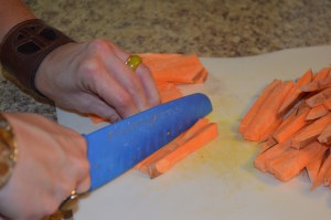 Sweet Potato Fries 2 large sweet potatoes olive oil 1 tsp garlic 1 tbsp parsley 1 tbsp rosemary sat and pepper Preheat oven to 450 degrees. Cut sweet potato fries into julienne slices.   On a large baking sheet (I used two), line the top with parchment paper.  Add julienne sweet potatoes and coat with olive oil (make sure you give them a nice coating of the oil).  Add garlic, parsley, rosemary, salt and pepper and stir again. Cook for about 15 minutes and then, flip fries and cook for 10-15 more minutes, depending on how crispy you want the fries. Grilled Corn on the Cob 4 ears of corn with the shook still on butter salt and pepper aluminum foil Since it was the first time I tried corn this way, I kind of "eye-balled" all of the ingredients.  You will need to cut the shook back, but do not remove it completely.  Do this to each ear of corn.  Coat the corn with salt and pepper and pull shook back to the corn.  Add little cubes of butter between the corn and the shook.  Repeat this for each corn.  Wrap in aluminum foil and grill on medium high heat for about 20 minutes. Grilled Chicken Sandwiches 4 boneless, skinless chicken breasts 8 slices of turkey bacon 1 tbsp minced garlic 1 tsp parsley 1 tsp rosemary 1 tsp paprika olive oil salt and pepper Coat both sides of chicken breasts in olive oil and above seasonings.  Grill on Medium High heat for approximately 8-10 minutes, flipping at least once. **Although the grilled chicken is good by itself, I turned this chicken into sandwiches.  Listed below are the ingredients I used for toppings. 4 Kaiser rolls 4 slices of provolone cheese 2 slices of turkey bacon per sandwich 1 Roma tomato iceberg lettuce mayonnaise **Butter the buns and toss them on the grill (bun side up) for extra flavor.