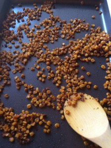 1 15 oz can, sweet, whole corn 1 tsp olive oil 1/2 tsp garlic salt salt and pepper to taste **This is the first time I made this and learned that the corn needs to be strained and left out to dry for at least an hour if you are using can corn.** Preheat oven to 400 degrees.  In a bowl, add corn, olive oil, garlic salt, salt and pepper; mix thoroughly.  Spread seasoned corn out on a non-stick cookie sheet.  Bake for 25 minutes or until corn has browned. **Make sure to stir corn every 10 minutes because it burns easily.**